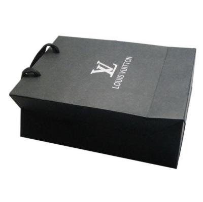 China Recyclable Wholesale Packaging Black Foiled Luxury Gift White Shopping Paper Bags With Embossing for sale