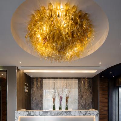 China Fancy Glass Hotel Hand-Blown Chandelier LED Decorative Art Postmodern Layout Lighting Creative Chandelier for sale