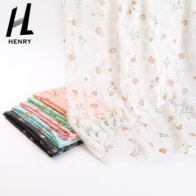 China Viable Wholesale Popular Light Weight Flower Pattern High Quality 100% Polyester Small Knit Mesh Fabric For Clothing for sale