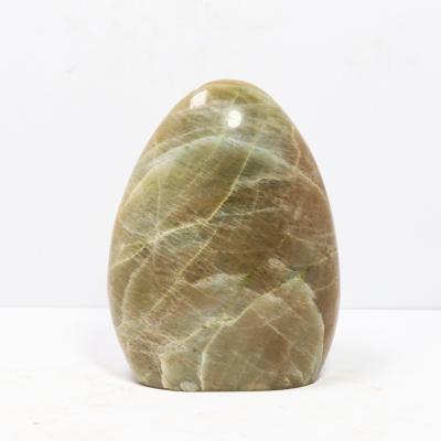 China Green Crystals Healing Stones Moonstone Reiki Stone Freeform Crafts From Europe For Meditation for sale