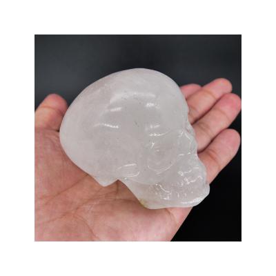 China Home Decoration Factory Price Carved Crystal Cluster Skulls Clear Quartz Crystal Alien Skull for sale