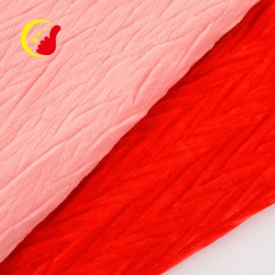 China Anti-Static Goods Stretch Ready Plain Solid Spandex Knitted Velvet Crushed Thin Textured Velvet Fabric for sale