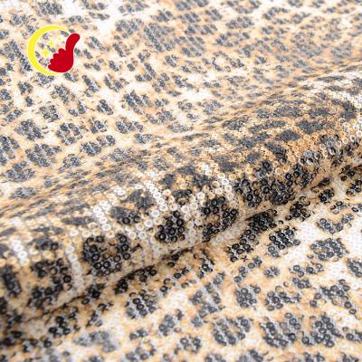 China Different Luxury Leopard Viable Design Mesh Sequins Embroidery Fabric For Dress Dress for sale