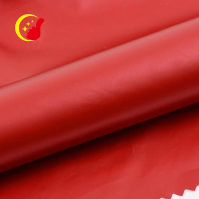 China Other New Design Wholesale Woven Plain Dyed Eco Friendly PU Leather Fabric For Garment for sale