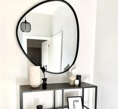 China OJC Modern Irregular Black Iron Glass Wall Metal Mirror Framed Accent Mirror Bathroom Mirror for sale