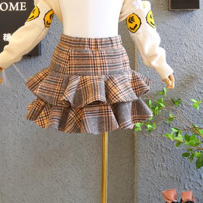 China 2019 breathable autumn and winter new children's clothing girls college wind lotus leaf wool cute plaid skirt for sale