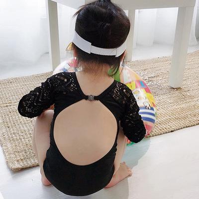 China Kids Girls Swimsuit Sunscreen Long Sleeves Vacation Bathing Suit Backless Children One Piece Waterproof Swimwear For Girls for sale