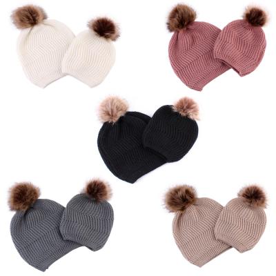 China 2019 New Hot Selling Plush Vertical Knit Wool Ball Solid Color Winter To Keep Ladies Baby Parent-child Warm Windproof Hat for sale