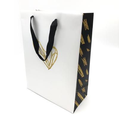 China Hand Length Outdoor Waterproof Handle Twisted Handle Paper Bags Food Paper Shopping Bags for sale