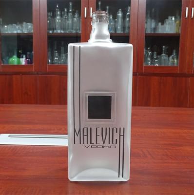 China Flint Glass Square Shaped Fancy 700ML Beverage Frosted Liquor Bottle for sale