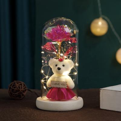 China Fashional Christmas Rose Glass Dome display with led flower light roses in glass dome with wooden base for decoration for sale