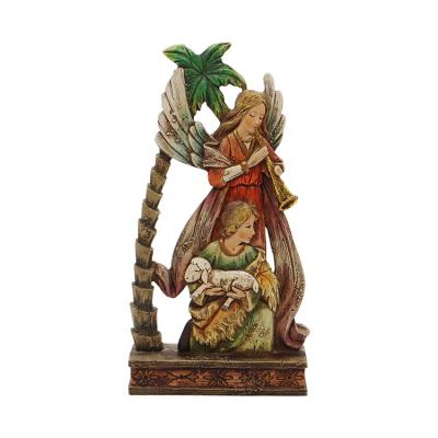 China All applicable the angel plays the groove next to the coconut tree. Teen Holds Lamb Resin Crafts Custom Resin for sale