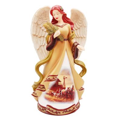 China All Applicable Custom Made Resin Thanksgiving Angel Holding Rice Home Decoration Gifts for sale