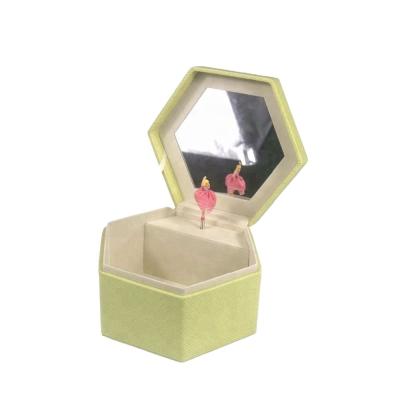 China 2021 Hot Sale China Leather Handmade Supplier Faux Leather Hexagon Shaped Music Box Jewelry Music Box for sale