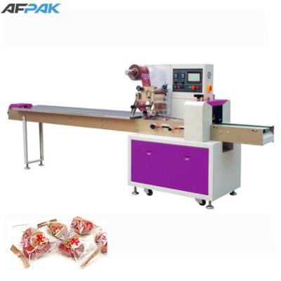 China Full automatic food candy/candy/chocolate ball small pillow pouch packing machine price for sale