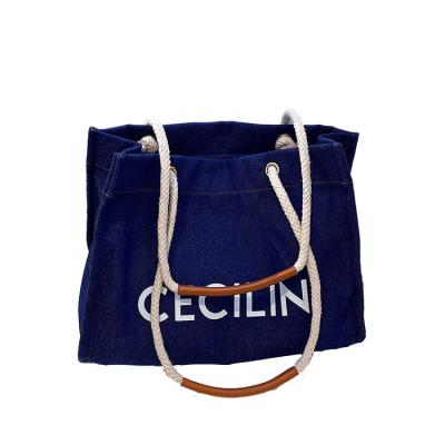 China Eco-friendly Women Blue Jeans Handbag Shoulder School Books Travel Shopping Bag With Rope Handle for sale