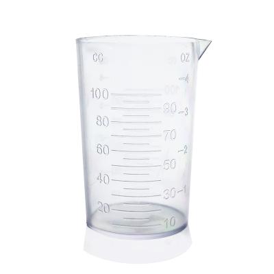 China Notebook& Wholesale Durable In Stock Transparent And Blue Measuring Barrel Durable 100ml Mug With Guide Mouth for sale