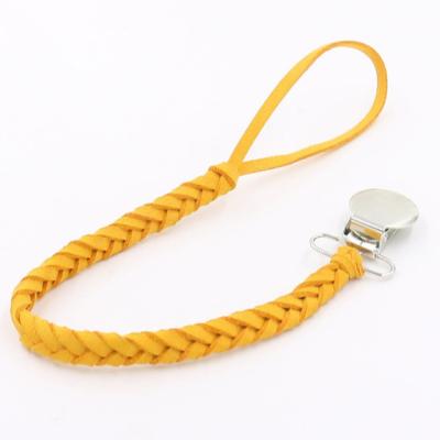 China Smoother Clip Baby Pacifier Free PU Boys And Girls PVC Handmade Braided Pacifier Holder Leash for sale