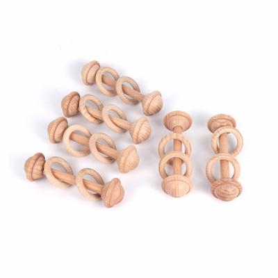 China Musical Baby Toddlers Rattle Shaking Toy Grasping Teething Wooden Ring Baby Rattle for sale