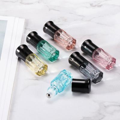 China Octagonal LOGO Roller Bottle Cosmetic Color Essential Oil Custom Perfume Bottle for sale