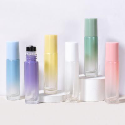 China Custom LOGO 10ml cosmetic gradient laser rose essential oil perfume bottles glass roll on bottle for sale