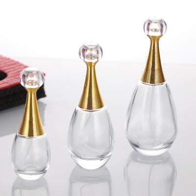 China Cosmetic Custom LOGO 30 50 100ml Water Drop Shape Luxury Clear Glass Perfume Bottle Spray Bottle for sale