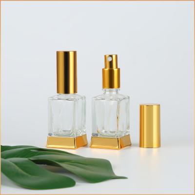 China Cosmetic Custom LOGO 30ml Plated Gold Base Square Glass Perfume Spray Bottle for sale