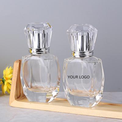 China Custom 30ml Cosmetic LOGO Premium Crysta LS And Diamonds Spray Top Glass Perfume Bottle for sale