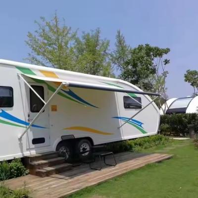 China Rollo manual sin preocupaciones Rv Toldo impermeable Caravana Toldos retráctiles en venta