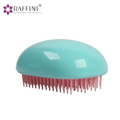 China New Compact Popular Egg Shape TPEE Detangling Hair Brush Egg for sale