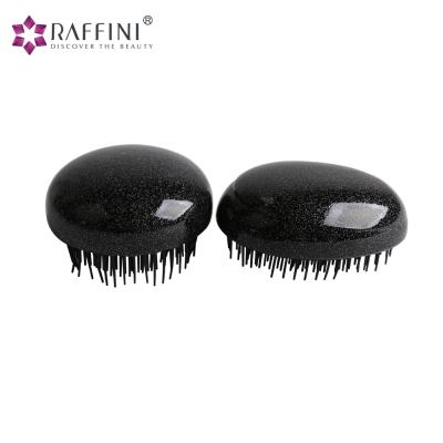 China Compact Well Designed Black Color ABS Popular Fashionable Detangling Hair Brush for sale