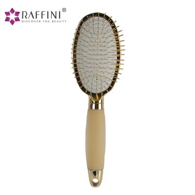 China Luxury Gold Cushion Oval Hair Brush With Soft Gel Handle for sale