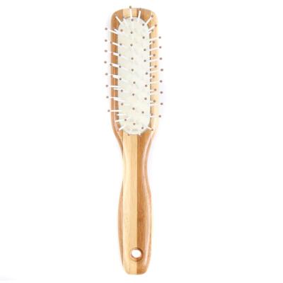 China Best Selling Eco-Friendly Bamboo Paddle Pad Rectangle Cushion Handle Hair Brush for sale