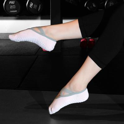 China Antibacterial Wholesale Cotton Anti Slip Yoga Socks With Grips For Women for sale