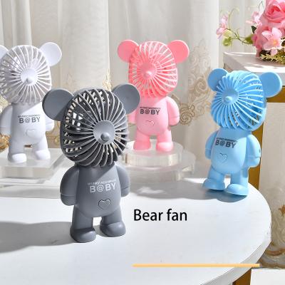 China 2022 New Fashion Neck+waist+hands Net Red Mini Gloomy Bear Desktop Violent Fan Doodle Bear Colorful Bear Fan for sale