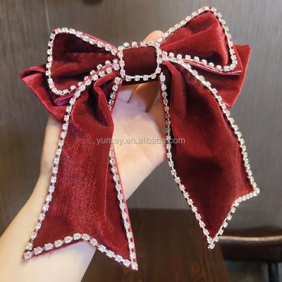 China Popular fabric bow with crystal headband for women girls kids girls bow hair clip fashion rhinestones hair accessories big hair bow for sale