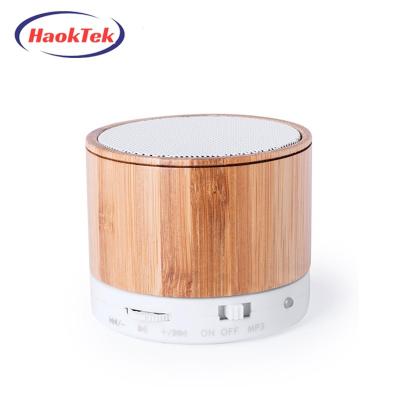 China HAOKTEK Wireless Viable Round Mini Bamboo Wood Speaker Bluetooth Small Portable Wireless Speaker for sale