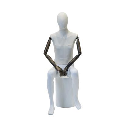 China Full Body Male Mannequin Sitting Down With Half Wrapped Cloth And Wooden Arms for sale