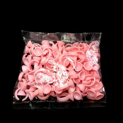 China Eyelash Extensions Glue Holder Professional Eyelash Extension Tool Glue Ring Pink Glue Cup Disposable for sale