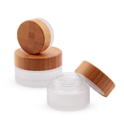 China Wholesale Bamboo Cosmetics Packaging Personal Skin Care Packaging Frosted Glass Jar Bamboo Lid For Cream for sale