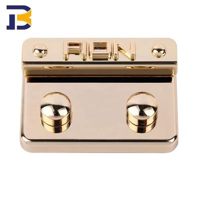 China Eco-Friendly Women Bag Metal Logo Clip Bag Lock 30mm Light Gold Twist Press Lock For For Handbags Luggage Leather Accessories for sale