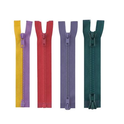 China Auto lock factory price good quality long chain nylon roll and eco-friendly resin plastic pull tabs for Garmant for sale