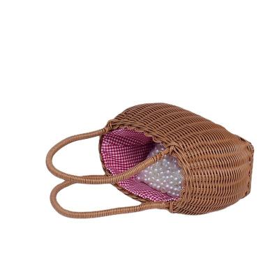 China Women's Straw Handbag Handmade Straw Clutch Beach Rattan Bag Woven Bag Waterproof Grass Clip Women's Bag for sale