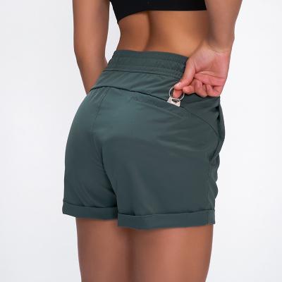 China Antibacterial Free Shipping Running Ware Women Nylon Spandex Shorts Shorts With Pocket for sale