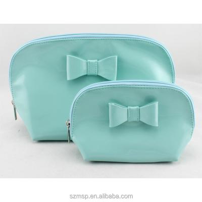 China Shinny fashion bowknot soft PU leather clutch for girl, make up pouch, 2pcs in 1 set travel kit beauty bag for sale