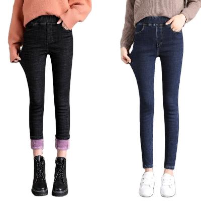 China 2021 winter new high warm outer wear breathable stretch small waist velvet jeans small foot pencil pants loose jeans for sale