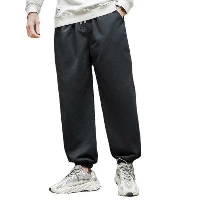 China 2021 Autumn new wholesale men's sports pants solid color fashion straight style breathable large size simple casual loose pants for sale