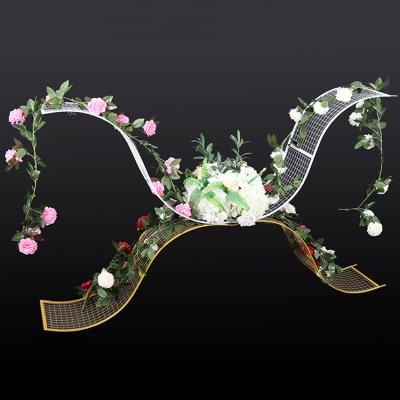 China European wedding party supplies iron wave road to lead artificial flower stands wedding props pedestals to wedding stage decoration for sale