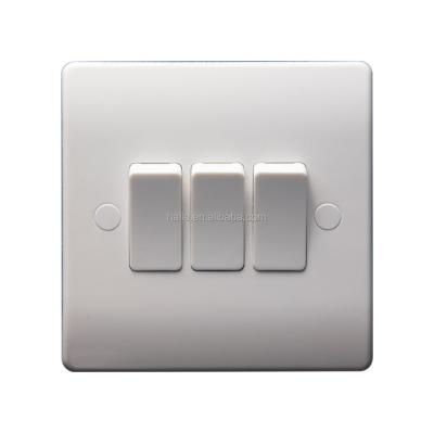 China UK Standard 3 Range Band 1 Way White British Bakelite Plate Wall Mounted Vertical Press Switch Pakistan for sale