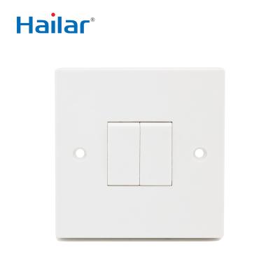 China Hailar 2 Gang 1 Way Bakelite Plate Wall Switch UK Standard Symbol Light Switch Universal Switch for sale